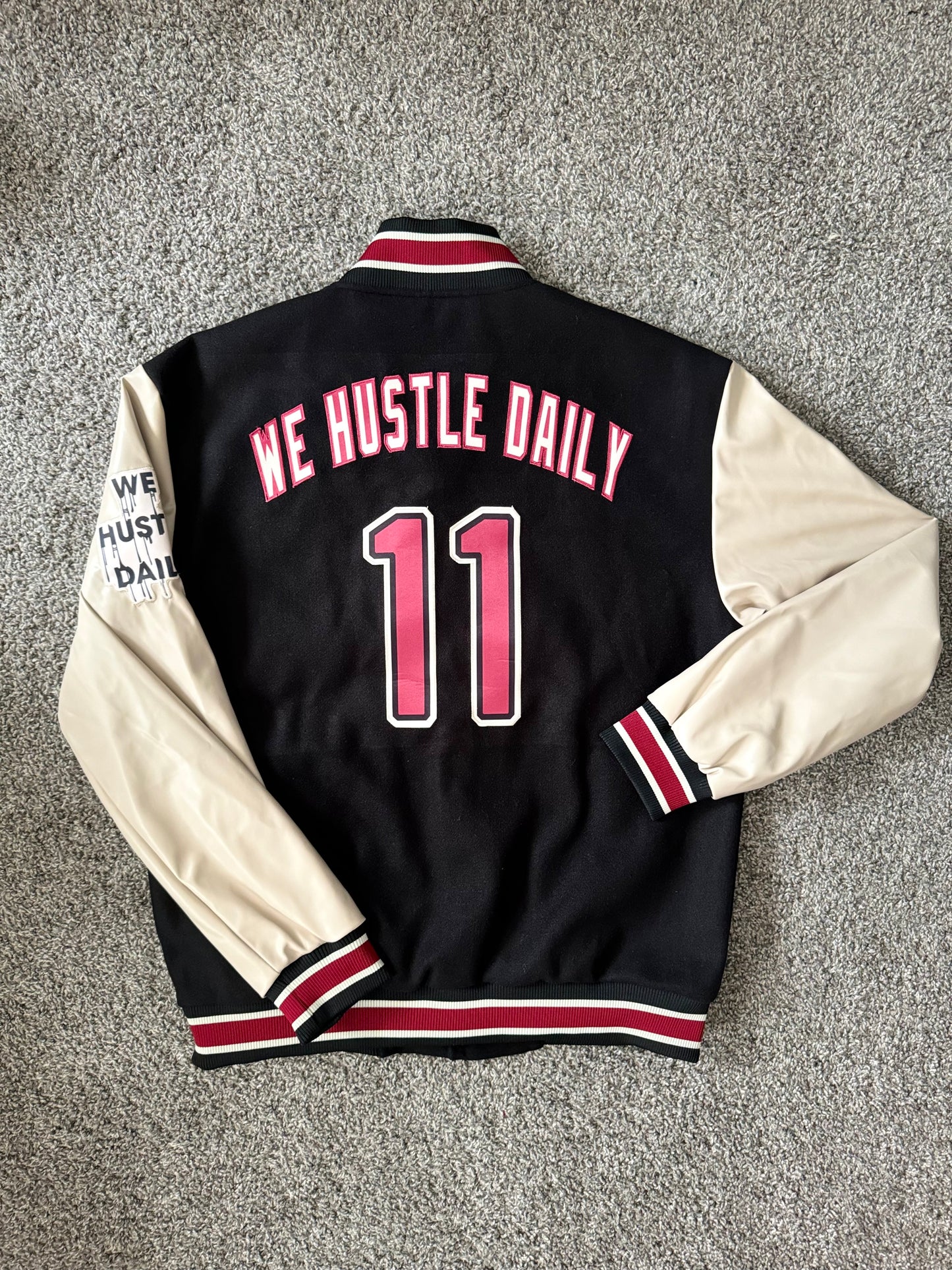 *Pre-Order WE HUSTLE DAILY VARSITY JACKET