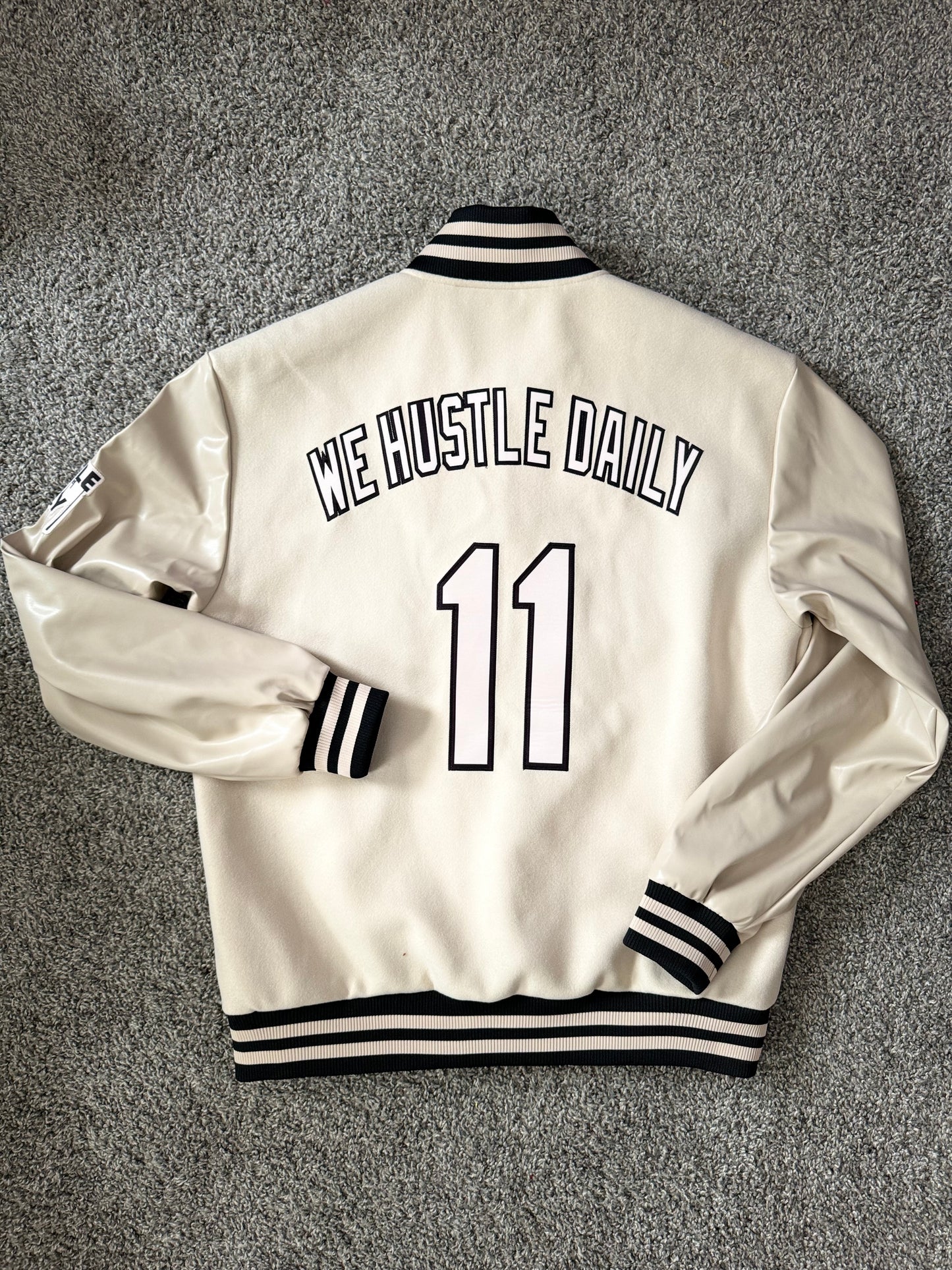 *Pre-Order WE HUSTLE DAILY VARSITY JACKET